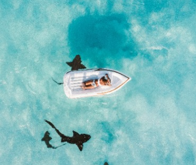 Aerial view of ocean and boat